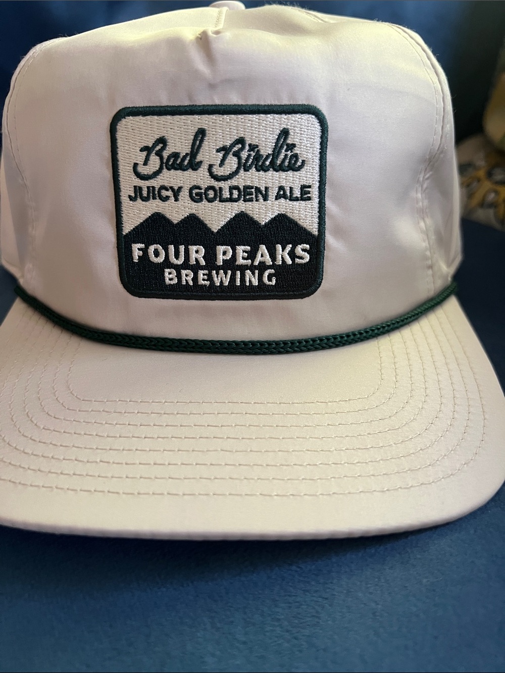 Bad Birdie/Four Peaks Brewing collab hat. White/Cream and green